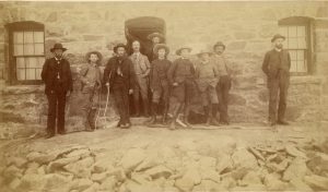 historic sepia photo of a group of men